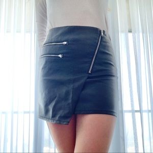 Black leather mini skirt with zipper detailing